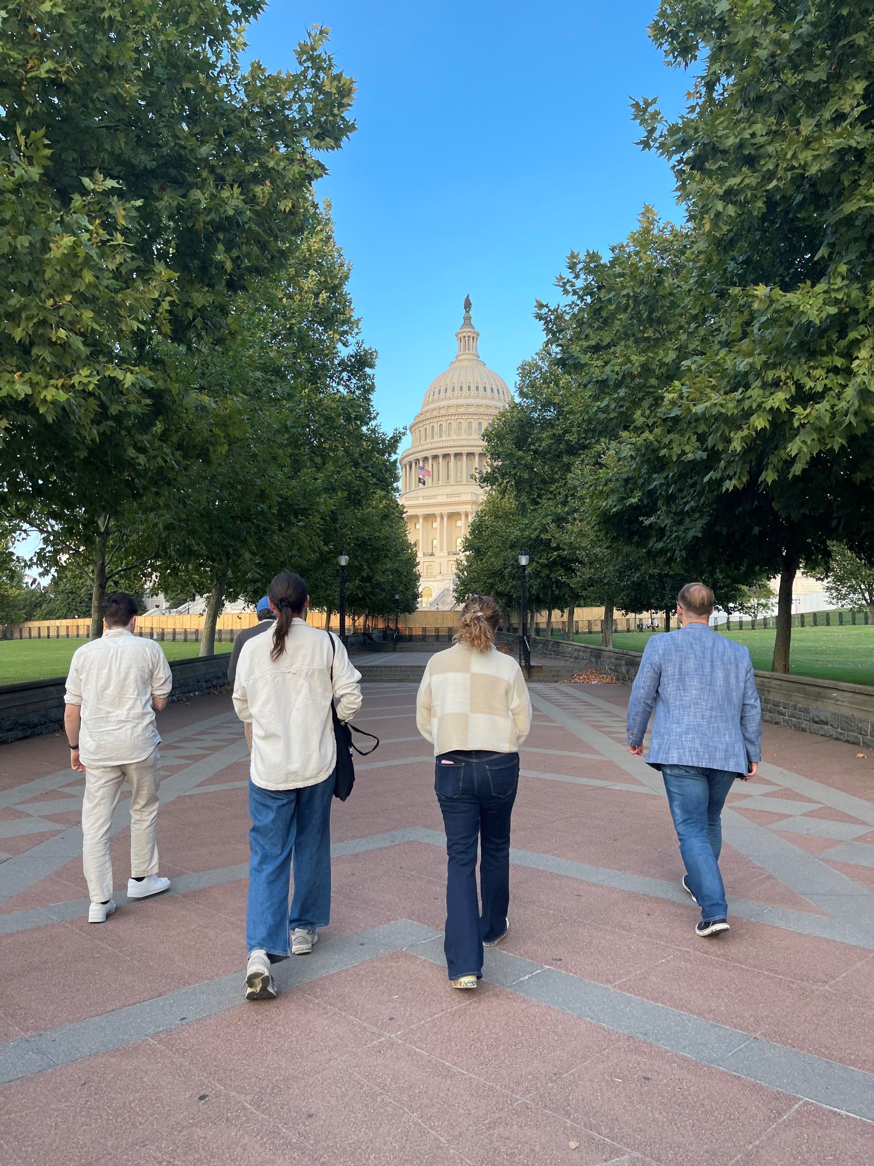 Photo of People Walking Towards the Capitol Building