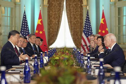 President Joe Biden listens as China's President President Xi Jinping speaks during their meeting