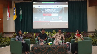 Three speakers and the Emcee for the second talkshow in Institut Pertanian Bogor (IPB) are sitting next to each other in the front of the room.
