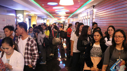 Cebuano teenagers and adults eagerly waited in line