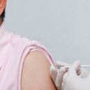 Doctor giving COVID-19 Vaccine shot to the patient for can help stop a pandemic, COVID-19 vaccines can help reduce the transmission of the new coronavirus from person to person. 