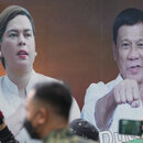 Ein Fahrzeug mit Fotos des philippinischen Präsidenten Rodrigo Duterte, rechts, und seiner Tochter, der Bürgermeisterin von Davao City, Sara Duterte