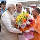 The Prime Minister, Shri Narendra Modi being received by the Governor of Uttar Pradesh, Shri Ram Naik, the Union Home Minister, Shri Rajnath Singh and the Uttar Pradesh Chief Minister designate Yogi Adityanath, on his arrival, at Lucknow, Uttar Pradesh on March 19, 2017.