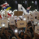  People attend a 'March for Europe' in support of the country's membership in the European Union, in Tbilisi, Georgia, 20 June 2022. 