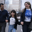 Former Nicaragua presidential candidate Felix Maradiaga reunits with his wife Berta Valle and his daughter Alejandra, walk together after Maradiaga arrived from Nicaragua