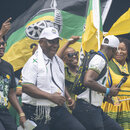 Der südafrikanische Präsident Cyril Ramaphosa feiert nach seiner Rede im Mose-Mabhida-Stadion in Durban, Südafrika, am Samstag, 24. Februar 2024, bei der Vorstellung des nationalen Wahlprogramms des Afrikanischen Nationalkongresses im Vorfeld der Parlamentswahlen 2024.