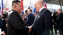 Putin and Kim shaking hands