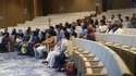 Participants, speakers, and organizers of IDEAS Liberalism Conference sitting in a tiered classroom at the end of the session.