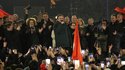 Kosovo's Prime Minister Albin Kurti celebrates with his supporters in front of the government building in Pristina, Kosovo 