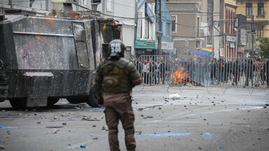 Principal avenue in Valparaiso, just few meters from Chilean National Congress, place where people carrying stones in their hands, faced police special group, trying to gets Congress front gate.