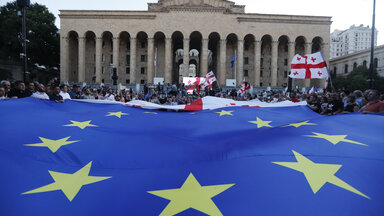 People attend a rally to support Georgia's membership in the European Union